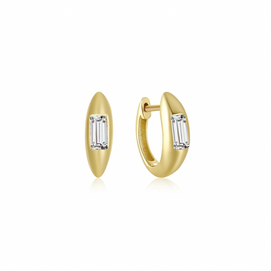 Get ready to shine with our GOLDEN GLIMMER HOOPS! Made with a special glimmering finish, these hoops add a touch of sparkle to any outfit. Effortlessly elevate your style and make a statement with these unique hoops. Perfect for any occasion and a must-have for any jewelry collection.

Material: .925 Sterling Silver + 18K gold plated
