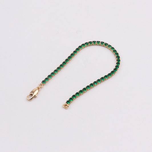 Shine bright like royalty with this 18K gold filled 3mm cubic zirconia emerald tennis bracelet. The sparkling cubic zirconia gems paired with the regal emerald color will add a touch of elegance and playfulness to any outfit. 

This classic trend will add a touch of glam to any outfit. Get ready to hit a fashion ace with this must-have accessory. This bracelet is a winner!

A classic everyone needs the perfect tennis bracelet in the stacking game.

Material:18K gold filled