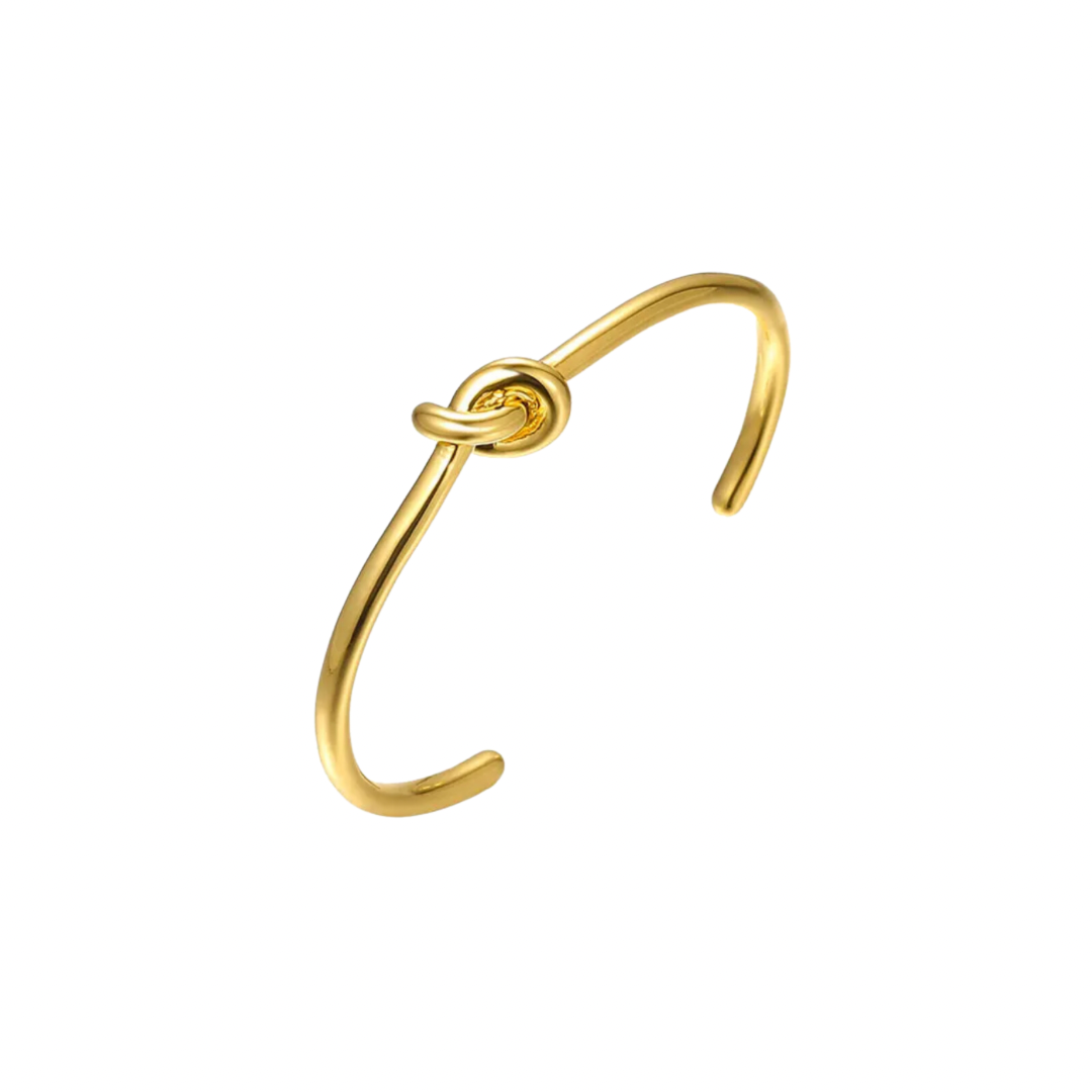 This elegant KNOT GOLDEN BRACELET features a unique knot design that symbolizes love and unity. Made with high-quality materials, this bracelet is the perfect accessory for adding a touch of sophistication to any outfit. Show your love and add this timeless piece to your jewelry collection.


Material:  100% brass and 18k gold plated

Measurements : 2.1 x 2.5 in