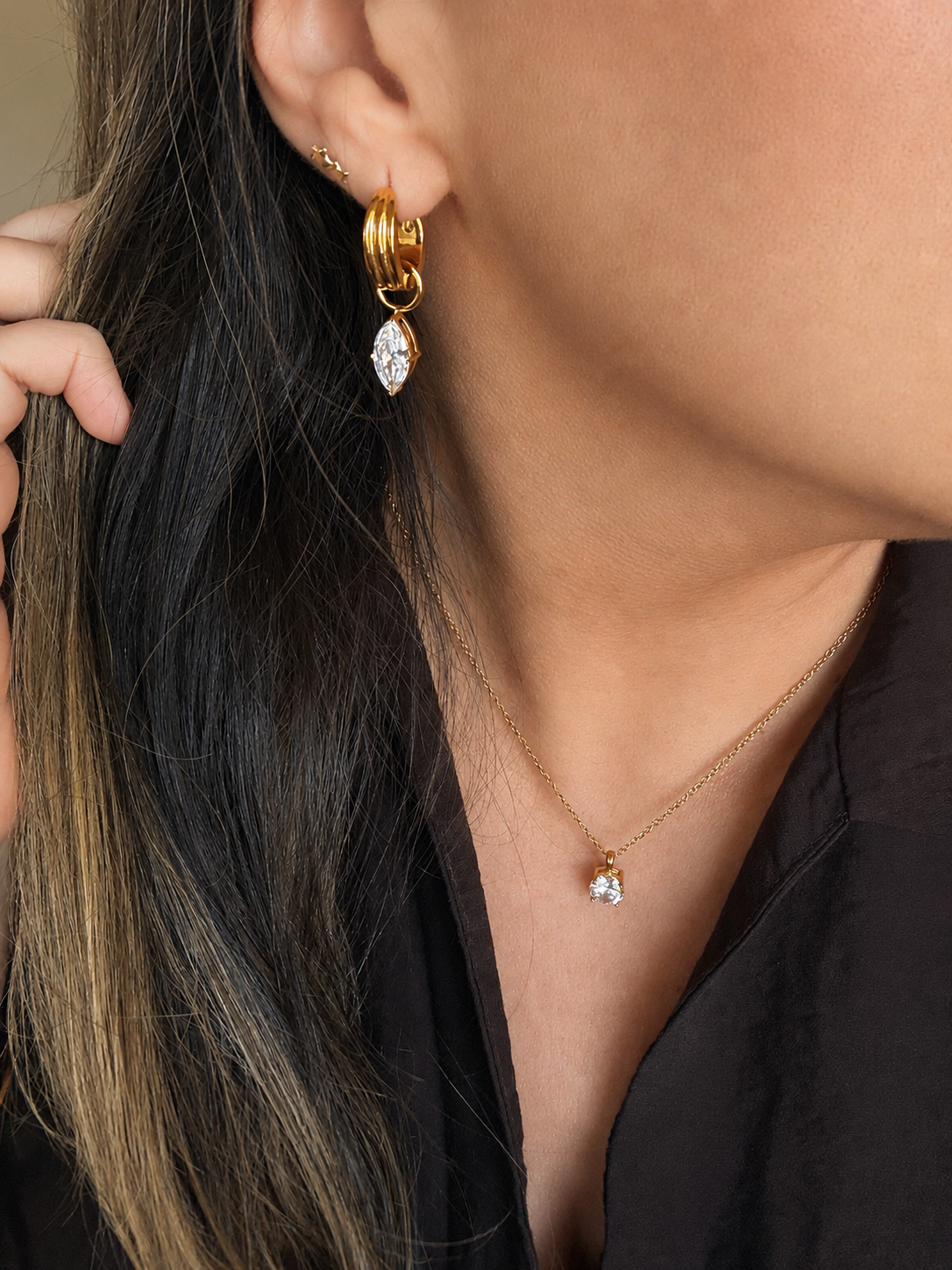 Brooke drop zircon huggie hoop earrings, marquise cut, worn on ear