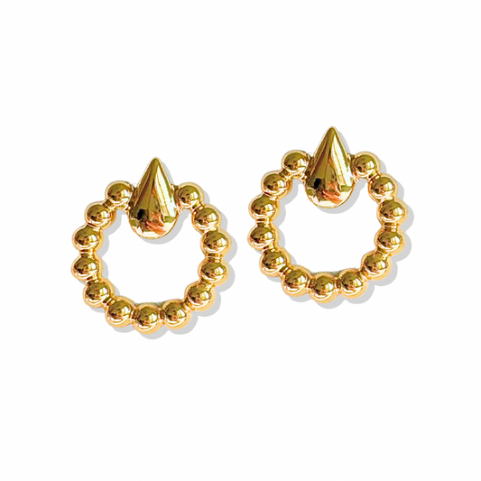 Long gold beaded earrings on model

Lightweight gold drop earrings for summer

Close-up of glam gold statement earrings