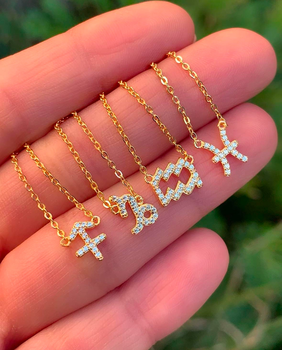 Close-up of Sagittarius zodiac pendant detail in 14K gold-plated sterling silver