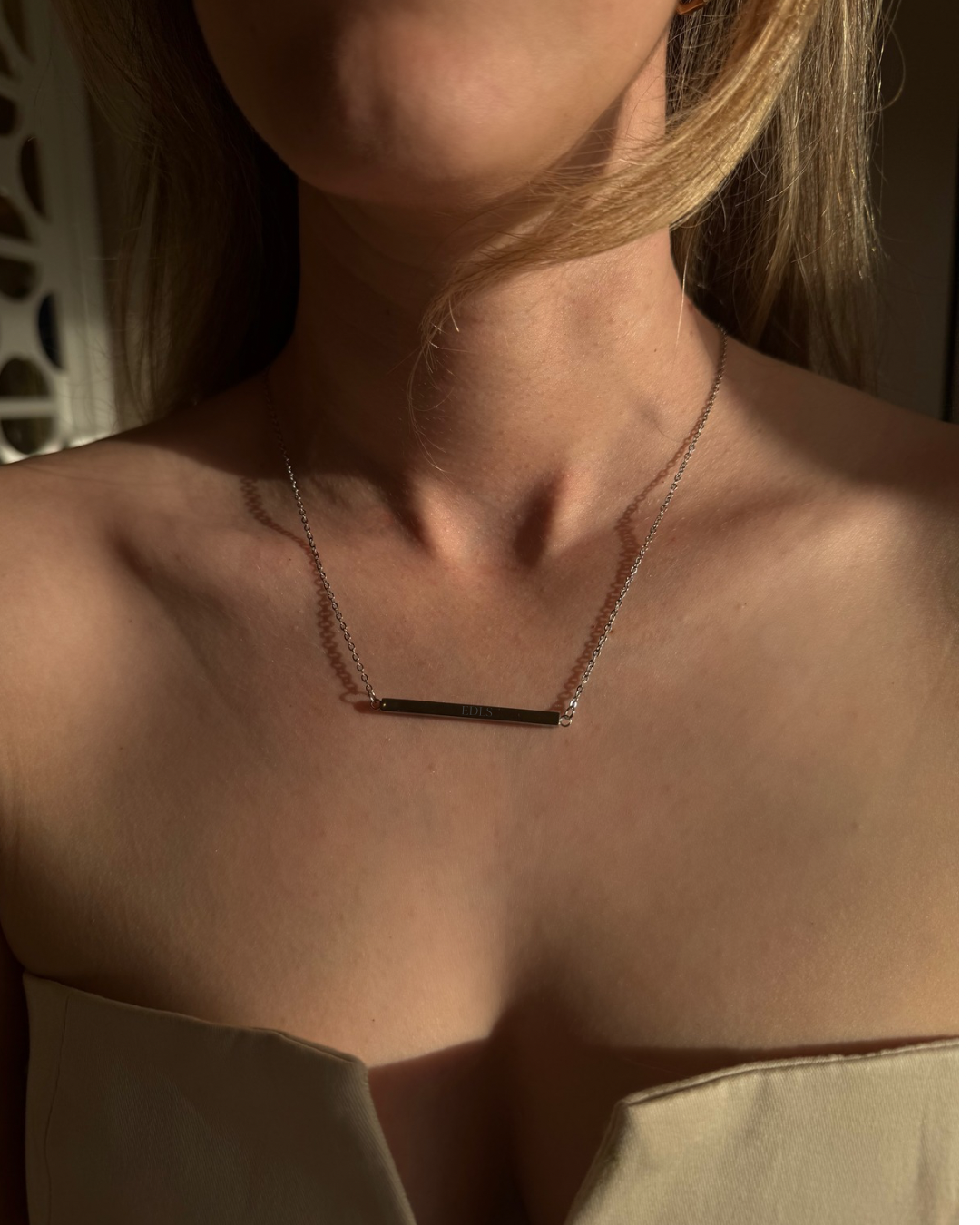 model wearing custom engraved silver bar necklace Fanie Marie Jewelry